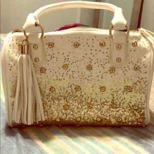 Gold and white purse